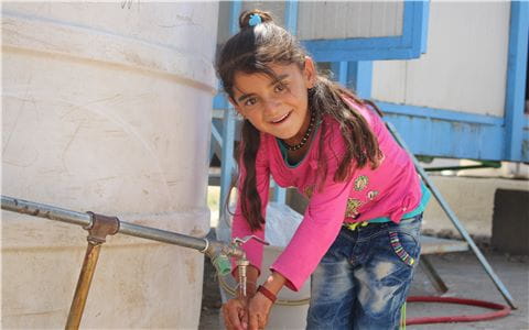 De l'eau potable dans un camp de réfugiés UNICEF
