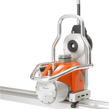 Husqvarna high-frequency electric wall saw units are easy to carry and attach to the track mounted on a concrete wall.