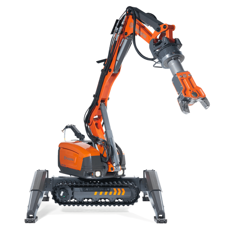 Remote demolition robot Husqvarna DXR 140 equipped with rotating steel shearer for high-precision cutting of metal structures.
